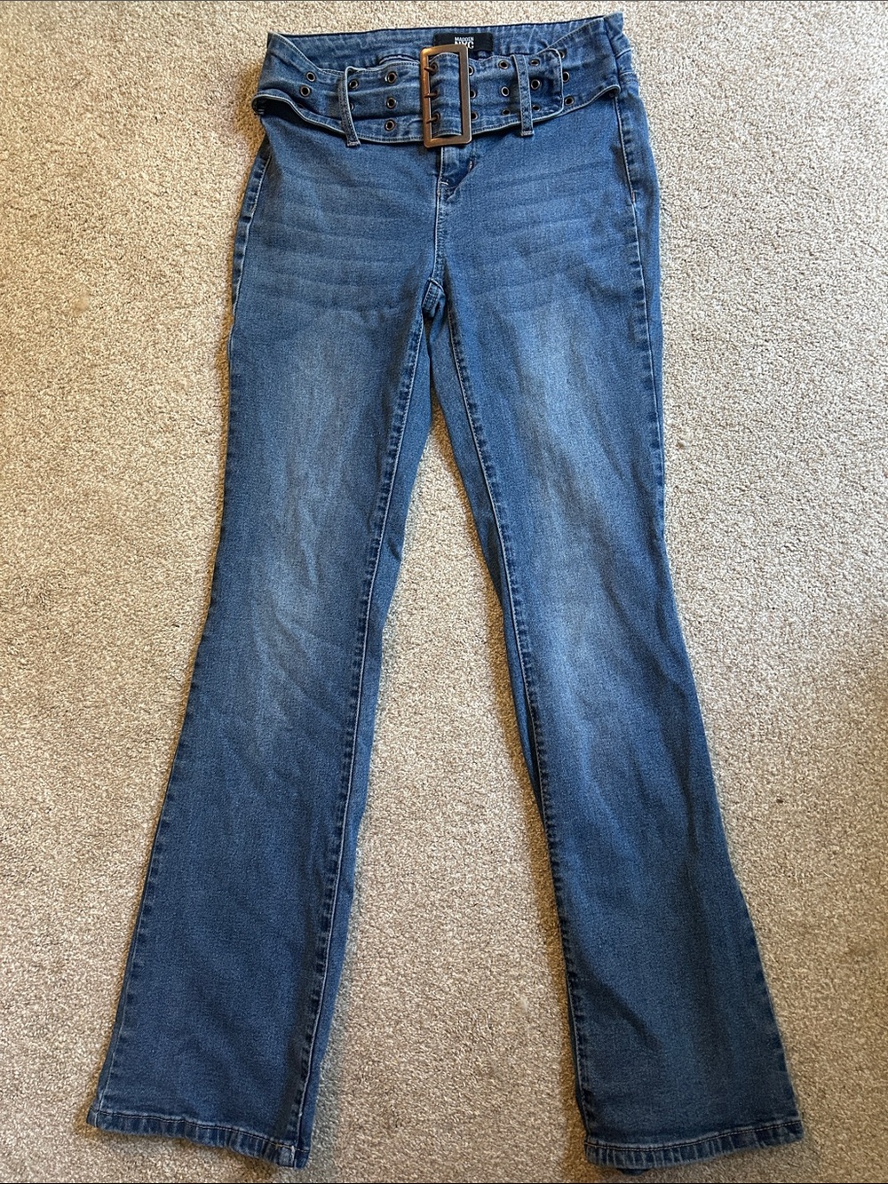 High-Rise Blue Flare Jeans with Statement Belt